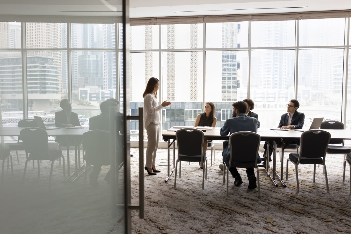 people in an office having a meeting